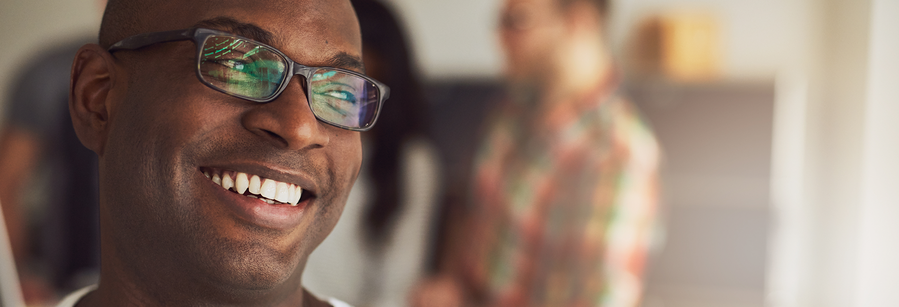 Smiling black male in glasses