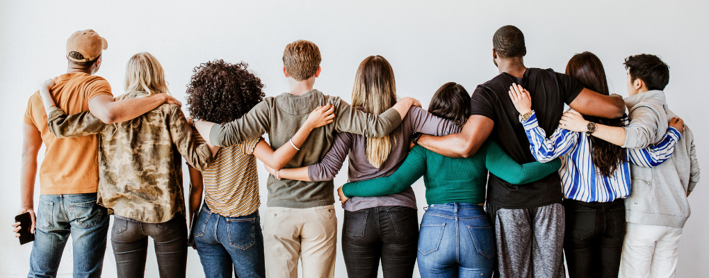 rise recovery group in dallas, diverse group of people with their arms around each other